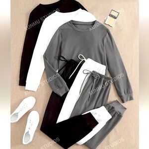 3 piece sweat seat. 3 sweatshirts and 3 sweatpants, Black,grey and white